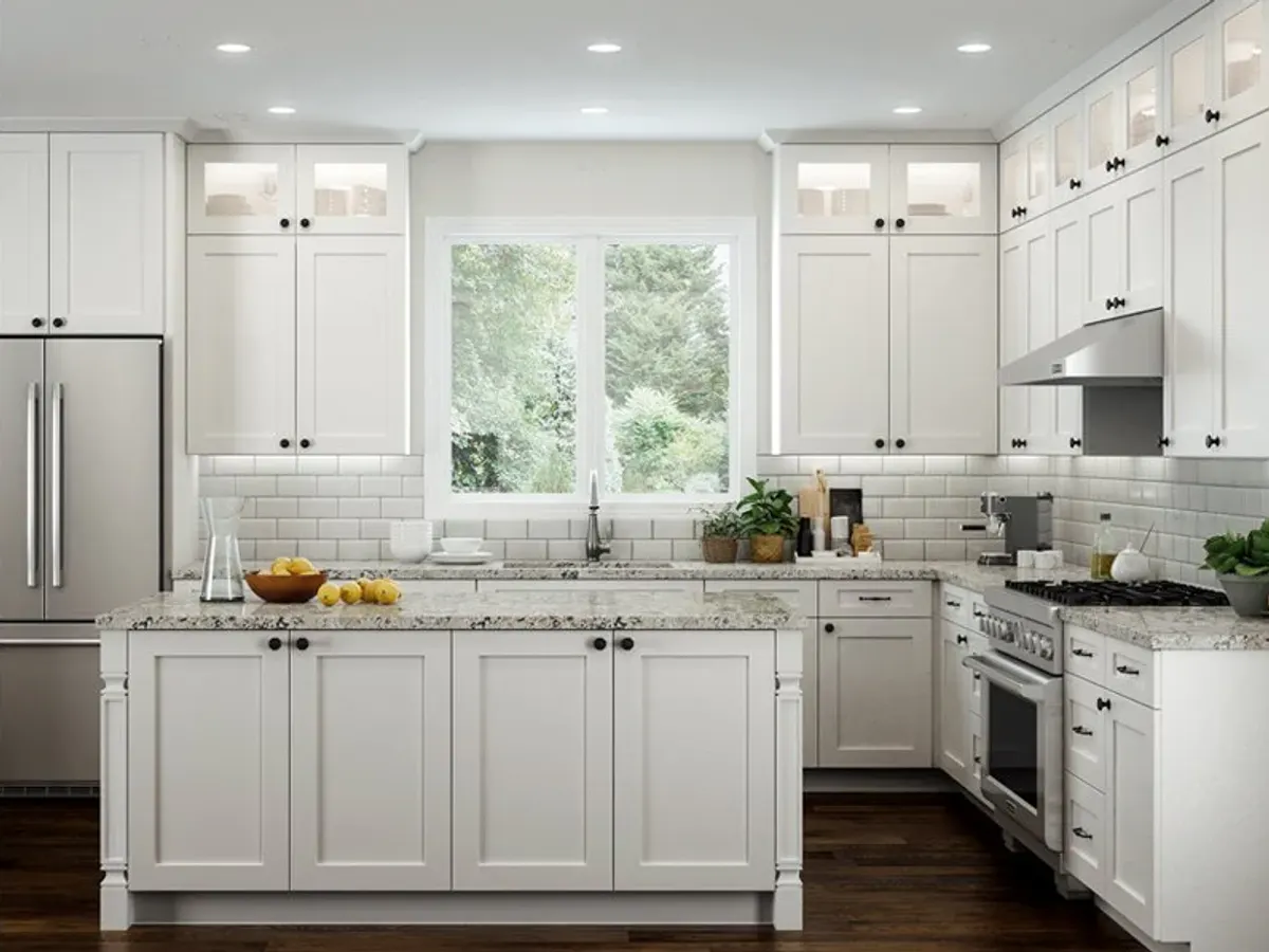 Custom fitted kitchen cabinetry with accent lighting.